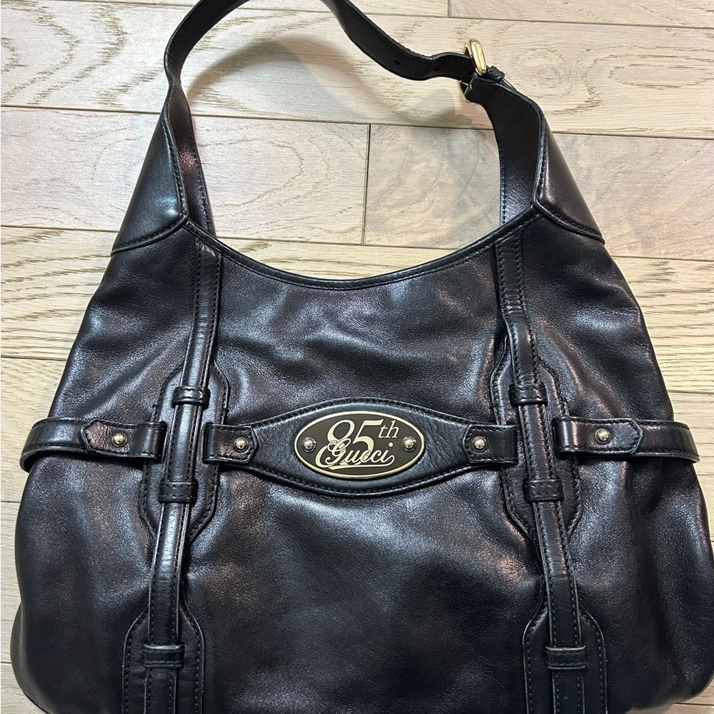 Gucci Black Shoulder Bag with Gold Hardware and Hobo Shape
